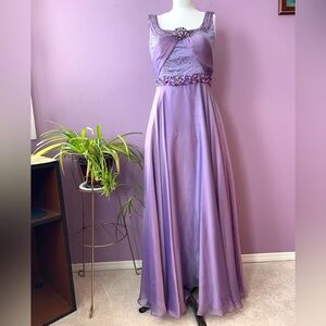 Gorgeous purple sleeveless maxi gown with beads and rhinestones